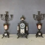 ساعت و شمعدان قرمز و مشکی برنز