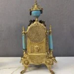 ساعت و شمعدان آبی فیروزه‌ ای و طلایی برنز