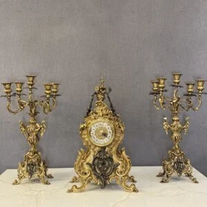 ساعت و شمعدان آنتیک طلایی برنز