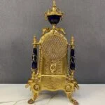 ساعت و شمعدان طلایی با ساعت آبی برنز