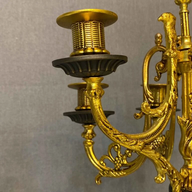 ساعت و شمعدان مشکی و طلایی برنز