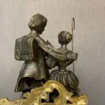 ساعت و شمعدان طلایی و قرمز طرح زن و شوهر