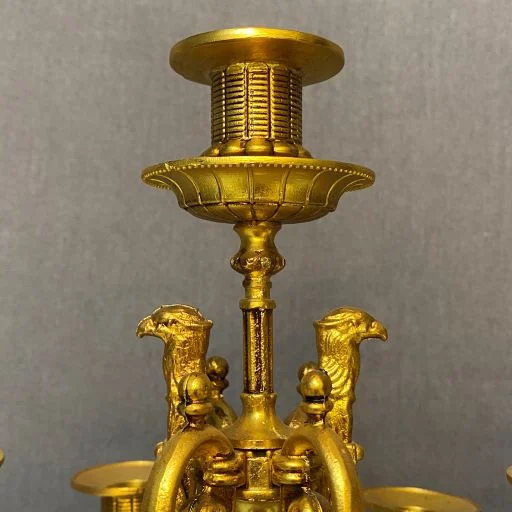 ساعت و شمعدان آبی و طلایی برنز