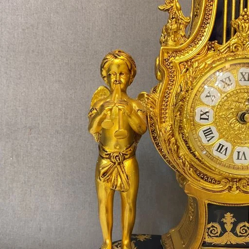 ساعت و شمعدان آبی و طلایی برنز