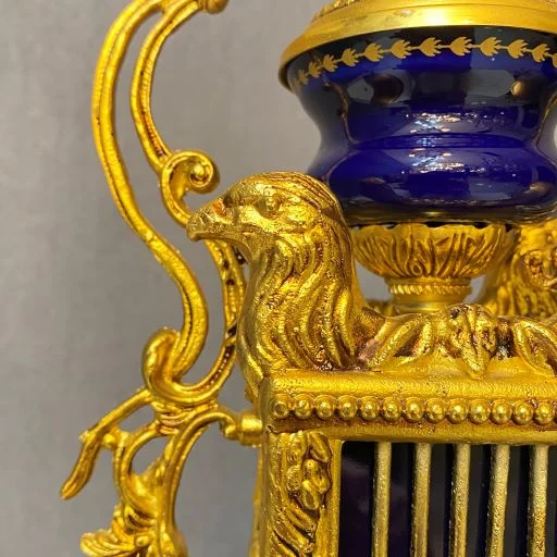 ساعت و شمعدان آبی و طلایی برنز