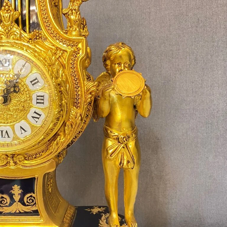 ساعت و شمعدان آبی و طلایی برنز