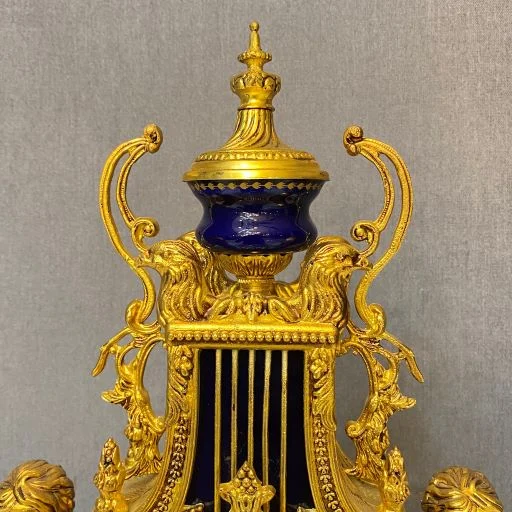 ساعت و شمعدان آبی و طلایی برنز