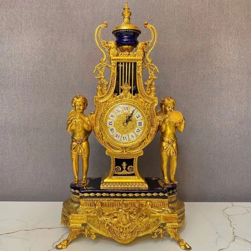 ساعت و شمعدان آبی و طلایی برنز